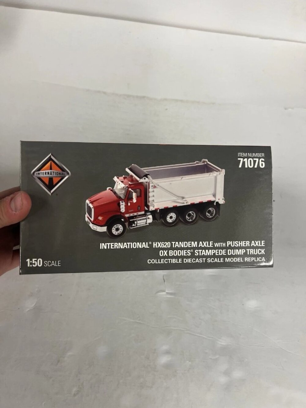 Diecast Masters International HX620 With Ox Body Dump truck 71076 1:50 scale